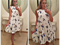 Платье свободного кроя 42-48, украшено фирменной лейбой Rich Moda , по