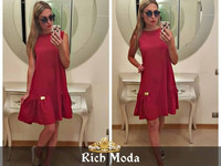 Платье свободного кроя 42-48, украшено фирменной лейбой Rich Moda , по