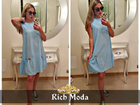 Платье свободного кроя 42-48, украшено фирменной лейбой Rich Moda , по