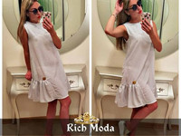 Платье свободного кроя 42-48, украшено фирменной лейбой Rich Moda , по