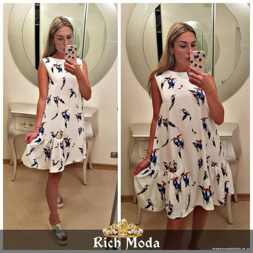 Платье свободного кроя 42-48, украшено фирменной лейбой Rich Moda , по