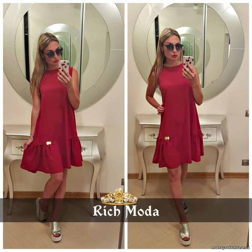 Платье свободного кроя 42-48, украшено фирменной лейбой Rich Moda , по